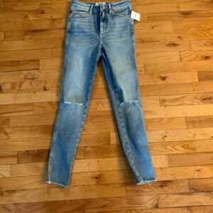 NWT We The Free Blue Jeans with Knee Holes